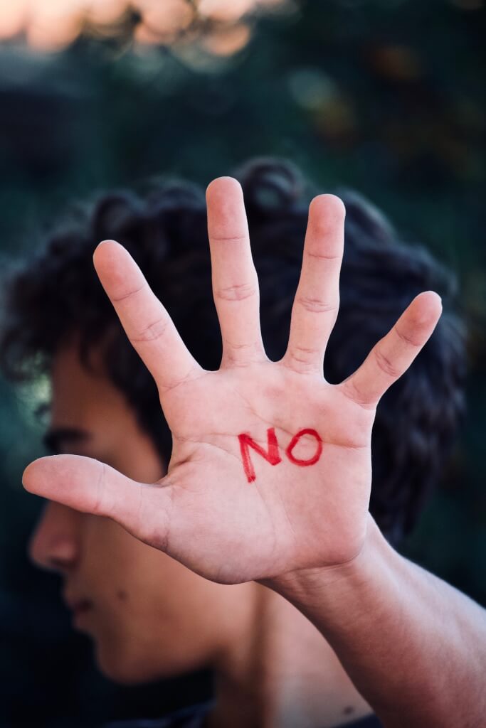 Eine Hand die ein klares Nein signalisiert