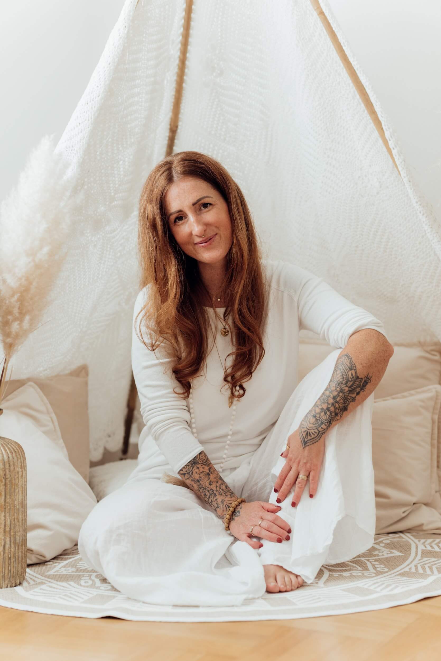 a group of people holding hands on top of a tree