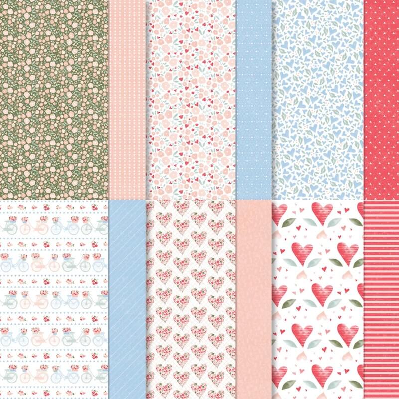 Übersicht der Designerpapiere mit Herz-, Blüten- und Punktmustern