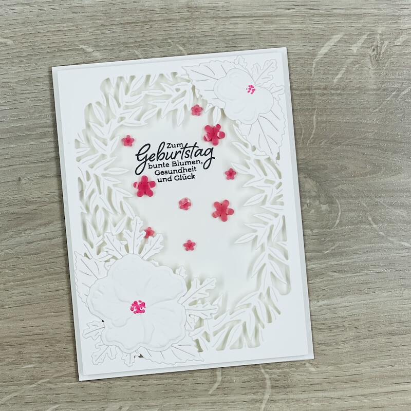 Schüttelkarte Zum Geburtstag mit ausgestanztem Blattmuster und pinken Blüten