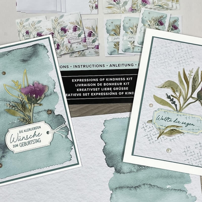 Karten mit Aquarell-Distelmotiv vor der Kreativset-Anleitung