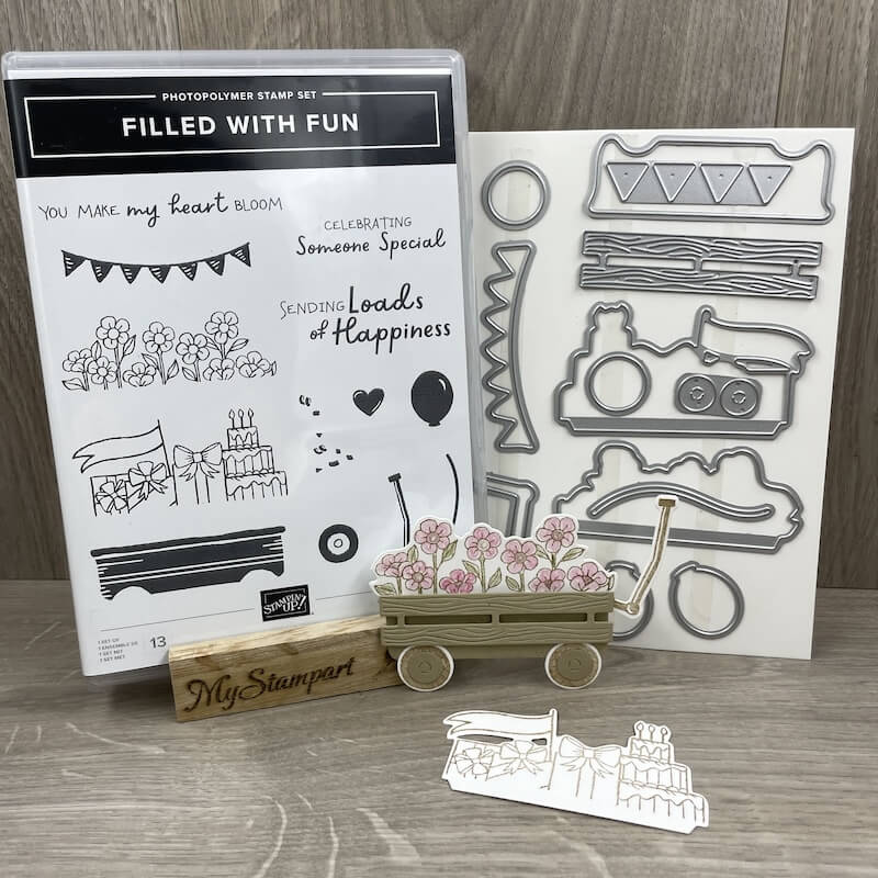 Produktpaket Filled with Fun: Stempel, Stanzformen und ein gestanzter Bollerwagen mit Blüten