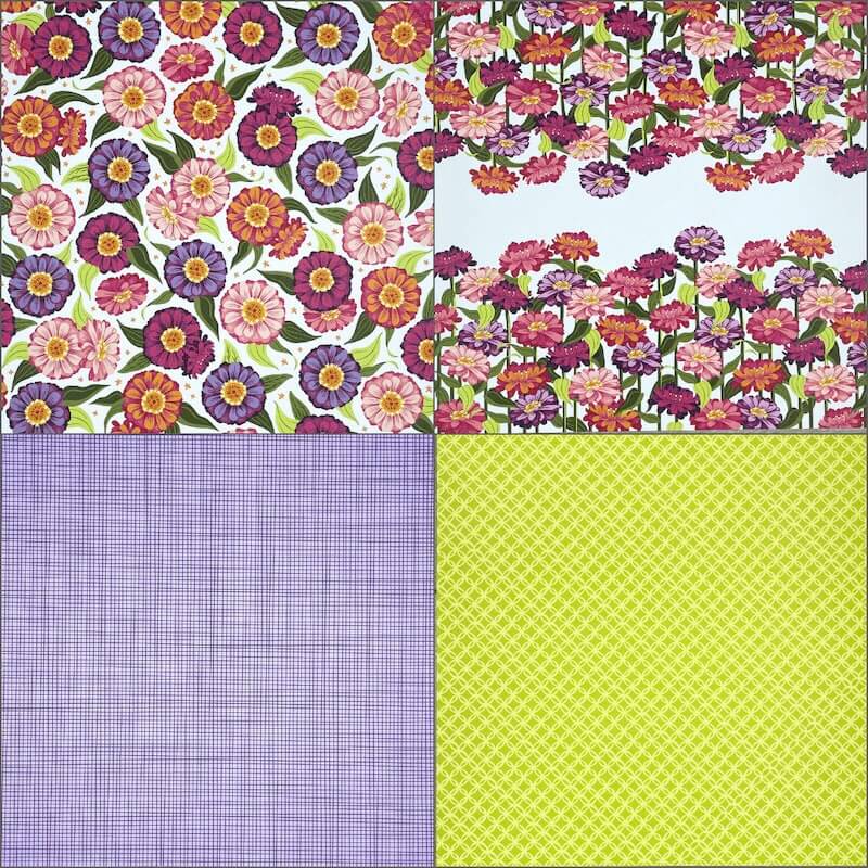 Vier Bögen des Designerpapiers Zinnienzauber, oben Vorder-, unten Rückseite