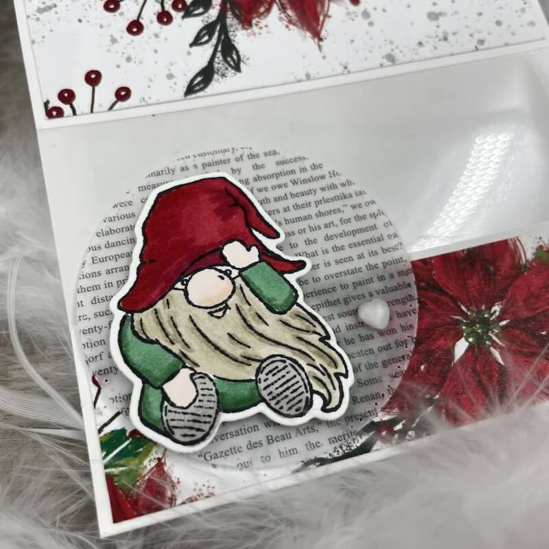 Detail mit koloriertem Wichtel auf Text-Hintergrund und Weihnachtsstern