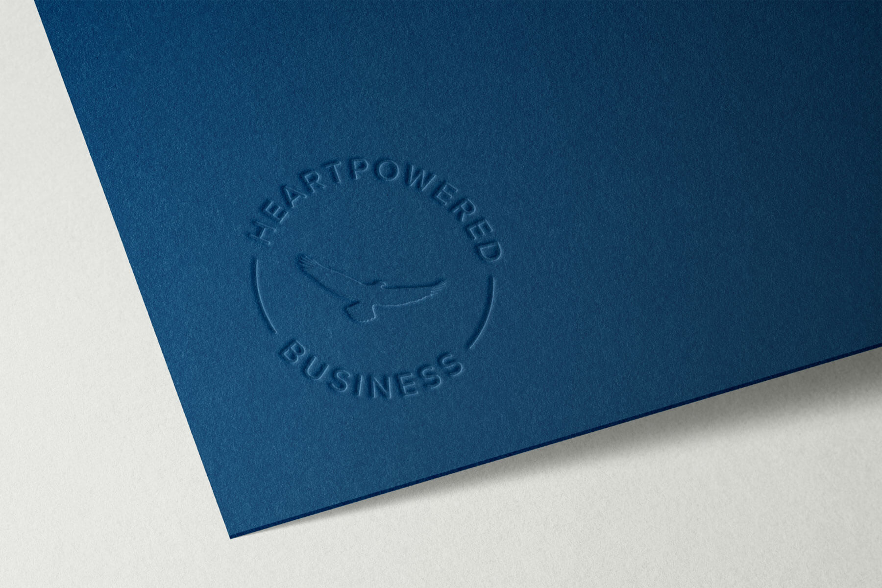 Logo geprägt von HeartPowered Business