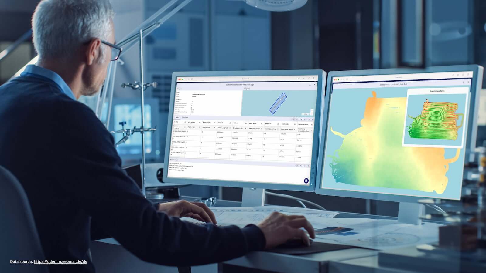 Man with two screens showing TrueOcean platform